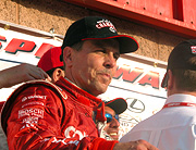 Scott Pruett on winner's podium.