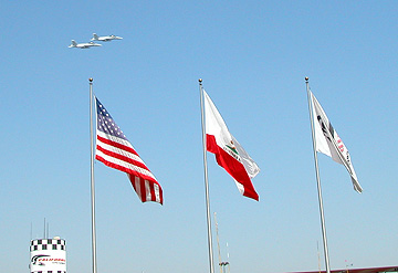 F-15s fly over.