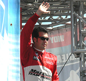 Sam Hornish waves.