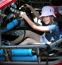 Little girl driving.