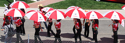 Umbrella girls on parade.