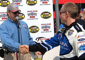 Mark Martin shakes with J.B.