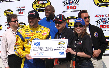 Elliot Sadler poses for group shot.