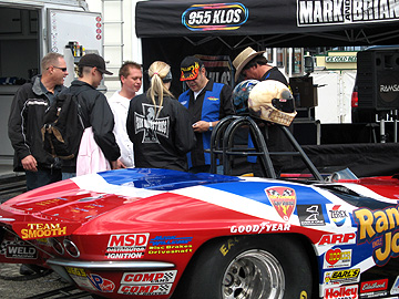 Fans gather around the Vette.