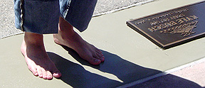 Bare feet in cement!