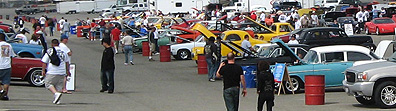 Wide shot of car show.