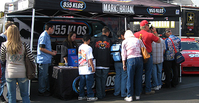 Lining up @KLOS booth.