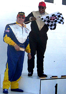 Joe Hall about to smack J.B. w/checkered flag.