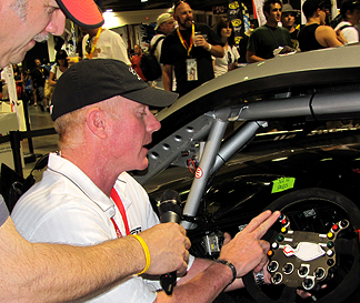 Checking out the super-trick steering wheel.