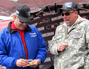 Two hat club dudes cracking each other up.