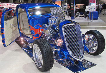 Front of beautiful blue roadster.