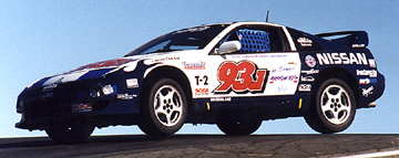 Unc's 300ZX flyin' over a hill.