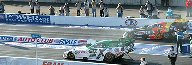 John Force and Tony Pedregon stage