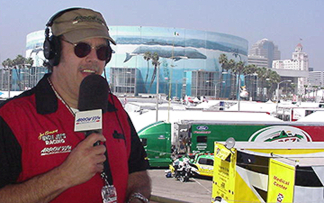 J.B. on air from atop the grandstand